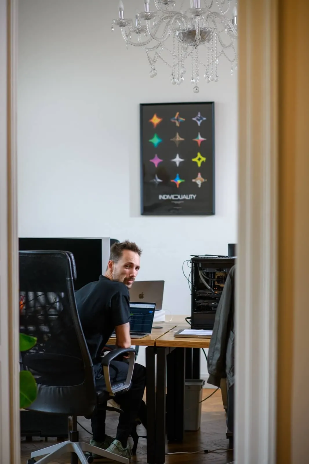 Our co-founder Michal happy as ever. Having a big smile over his MacBook setup. Good vibes!